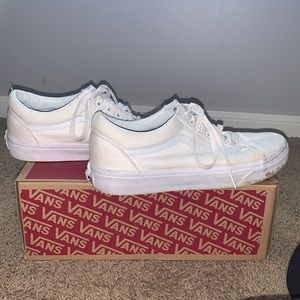 All white Old Skool vans.